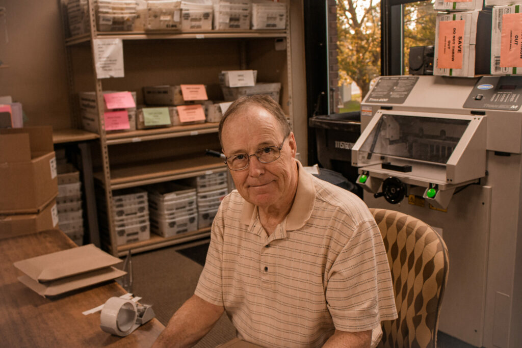 Dave prepares Bibles to be mailed to Crossroads students.