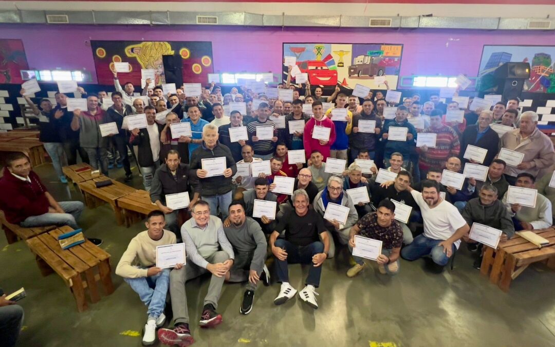 Juan Carlos Lara (seated front row, center of picture) with the first cohort of Crossroads students in Argentina to receive certificates of completion